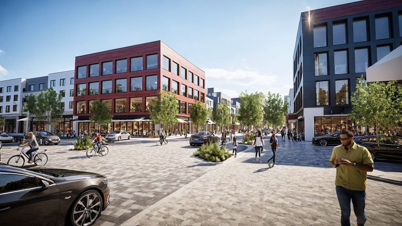 Corner view of the Greenbrier proposal, showing varied building heights and materials along a walkable street